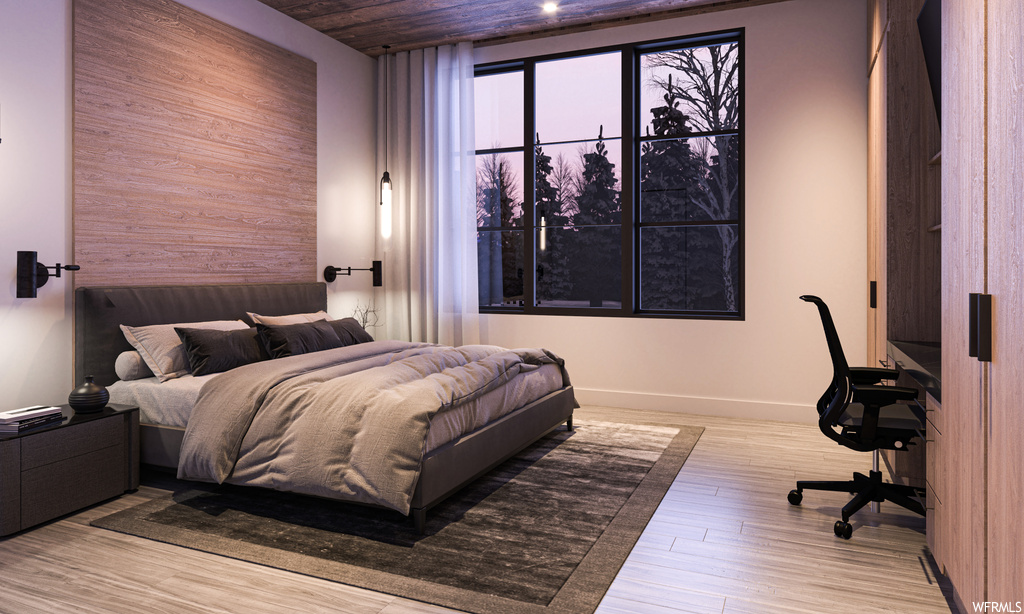 Hardwood floored bedroom with wooden walls and wooden ceiling