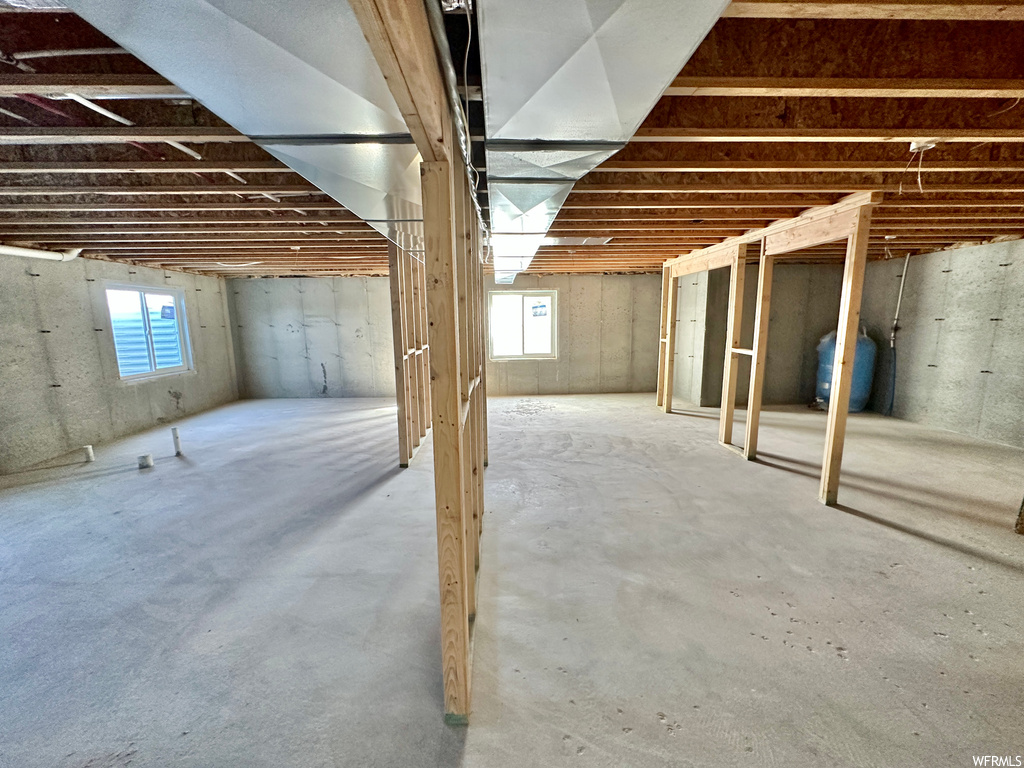 Basement featuring a healthy amount of sunlight