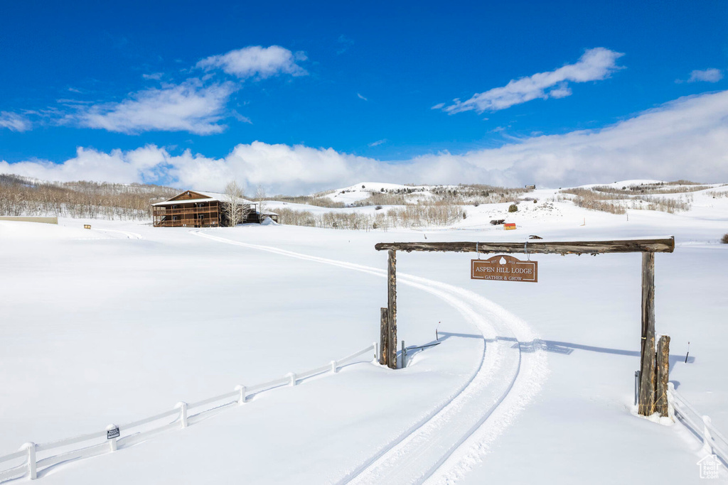View of yard covered in snow