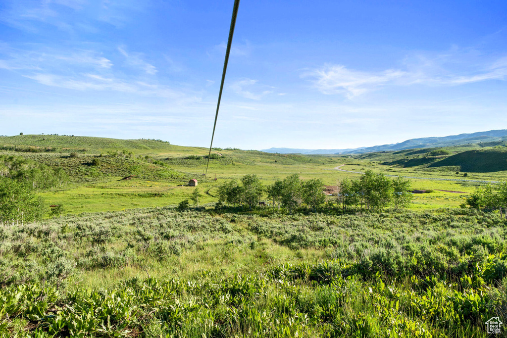 Property view of mountains featuring a rural view