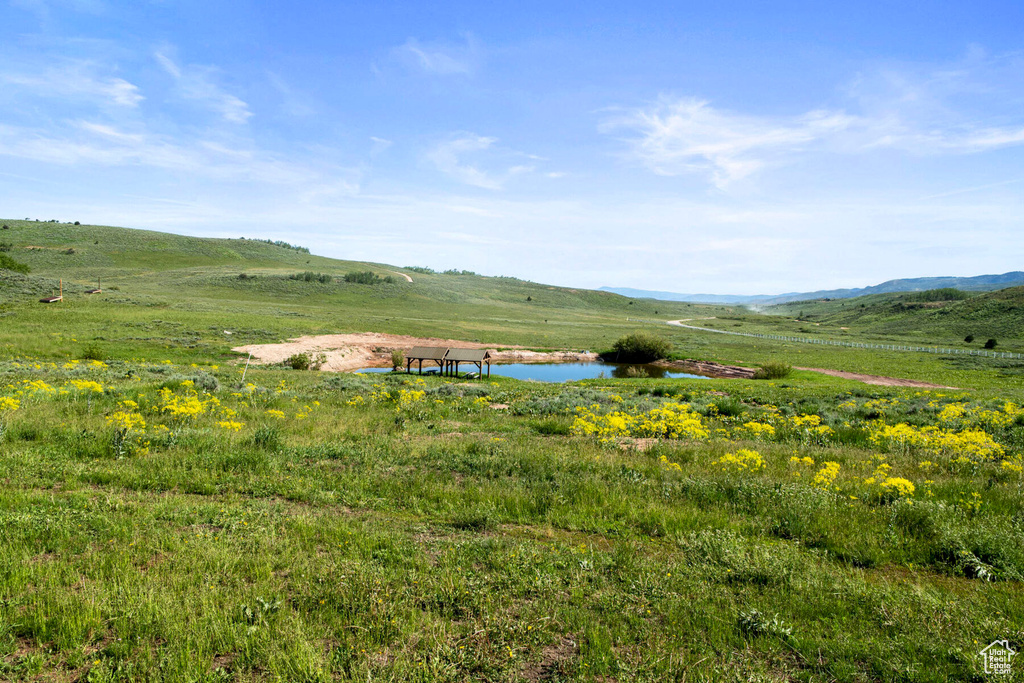 Mountain view with a rural view and a water view