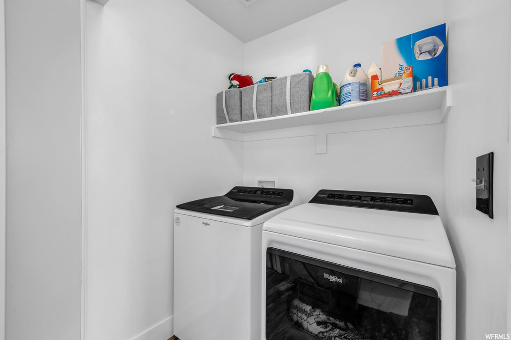 Clothes washing area with washer and clothes dryer and hookup for a washing machine
