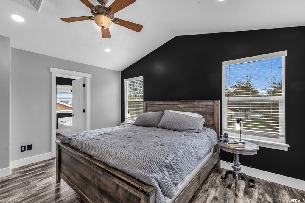 Bedroom featuring hardwood flooring, vaulted ceiling, and ceiling fan