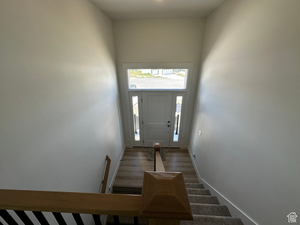 Doorway to outside featuring hardwood / wood-style floors