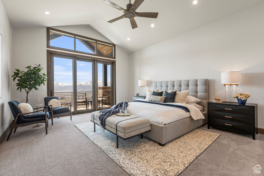 Carpeted bedroom featuring high vaulted ceiling, ceiling fan, and access to exterior