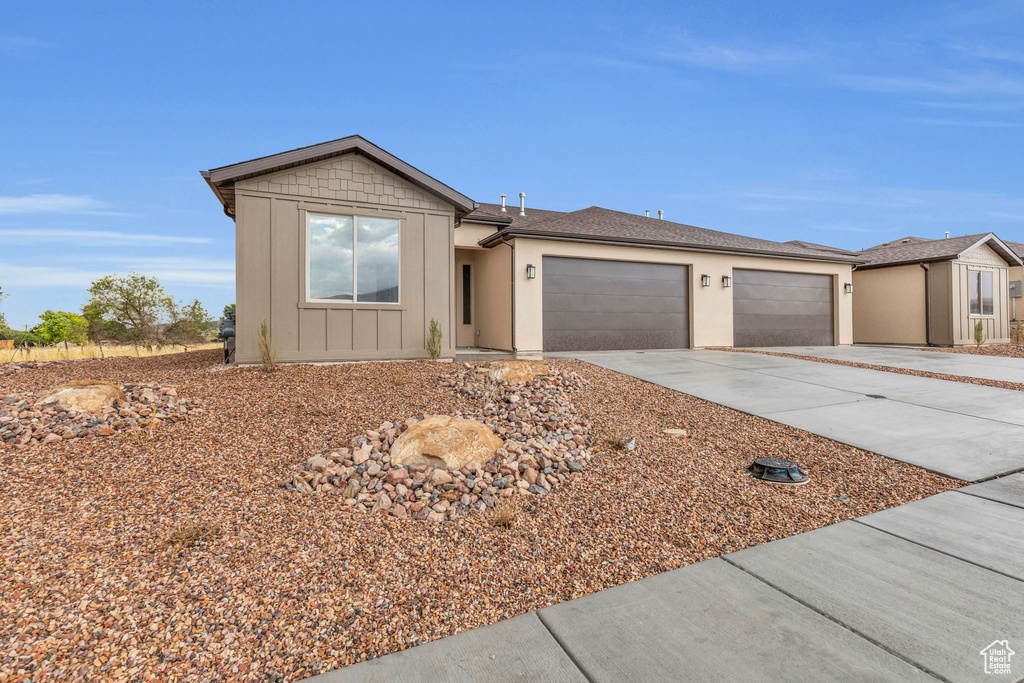 Ranch-style house with a garage