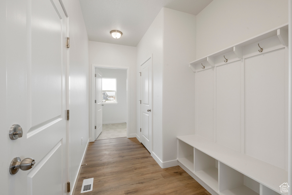 Mudroom featuring light hardwood / wood-style flooring