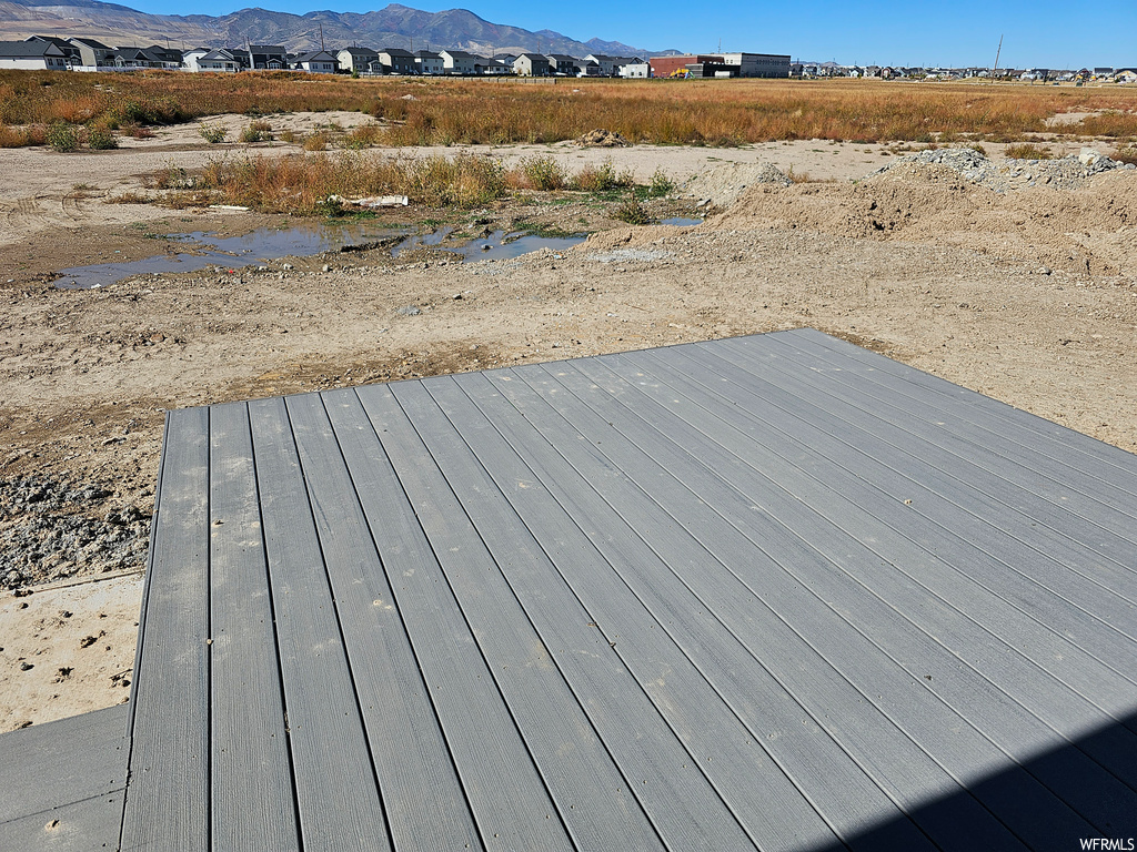 Wooden deck featuring a mountain view