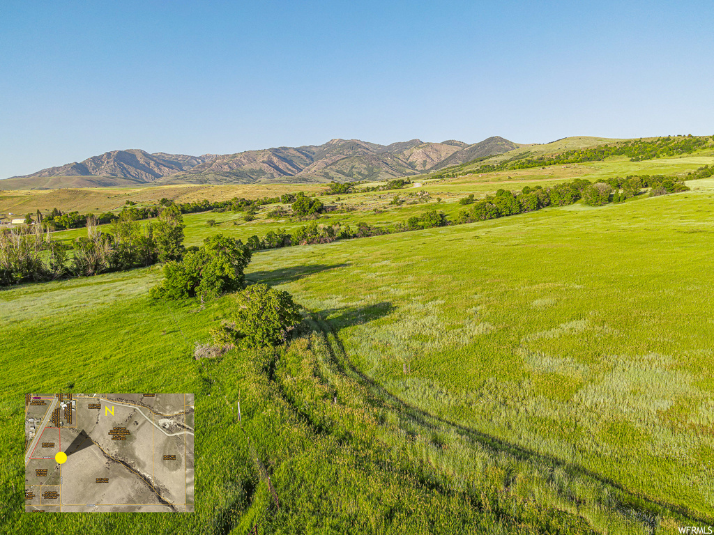 View of mountain feature with a rural view