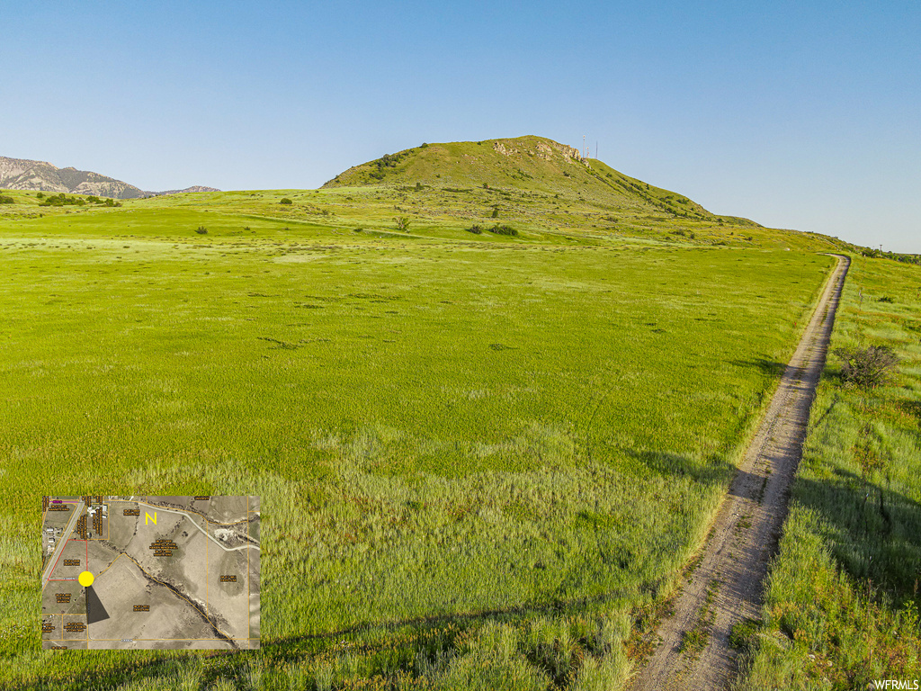 Property view of mountains featuring a rural view