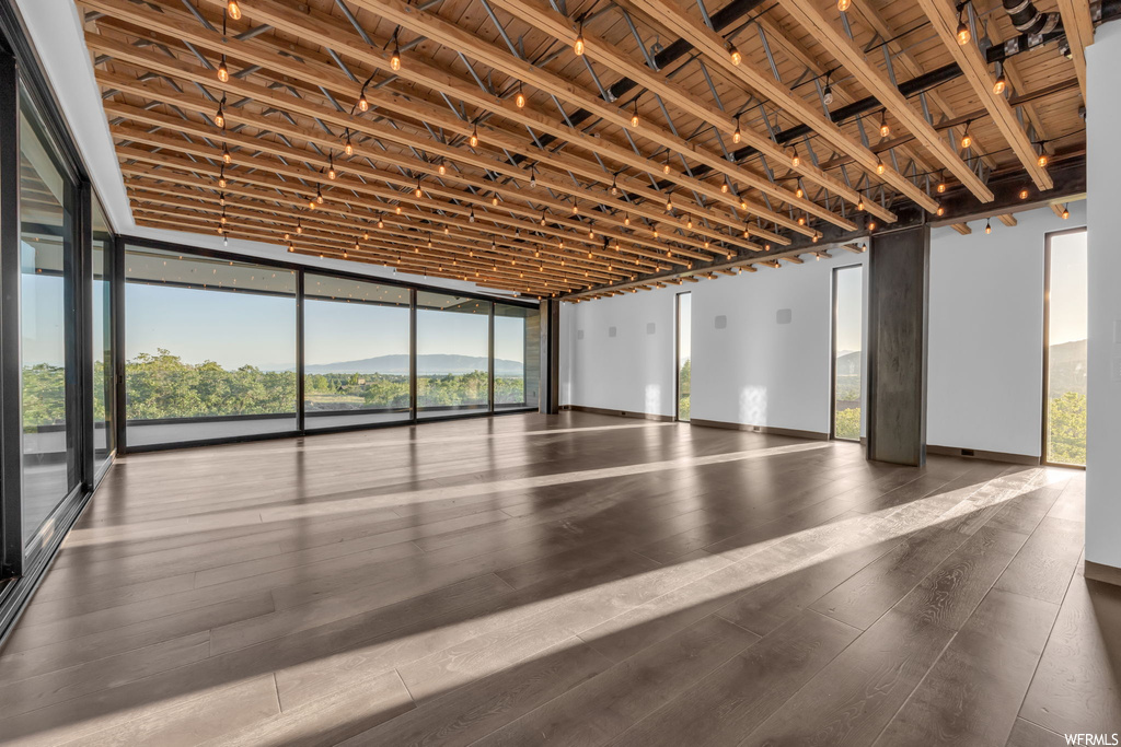 Interior space featuring dark hardwood flooring