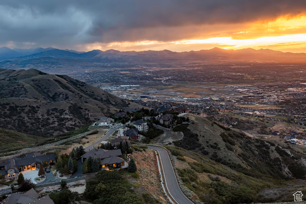 Aerial view at dusk featuring a mountain view