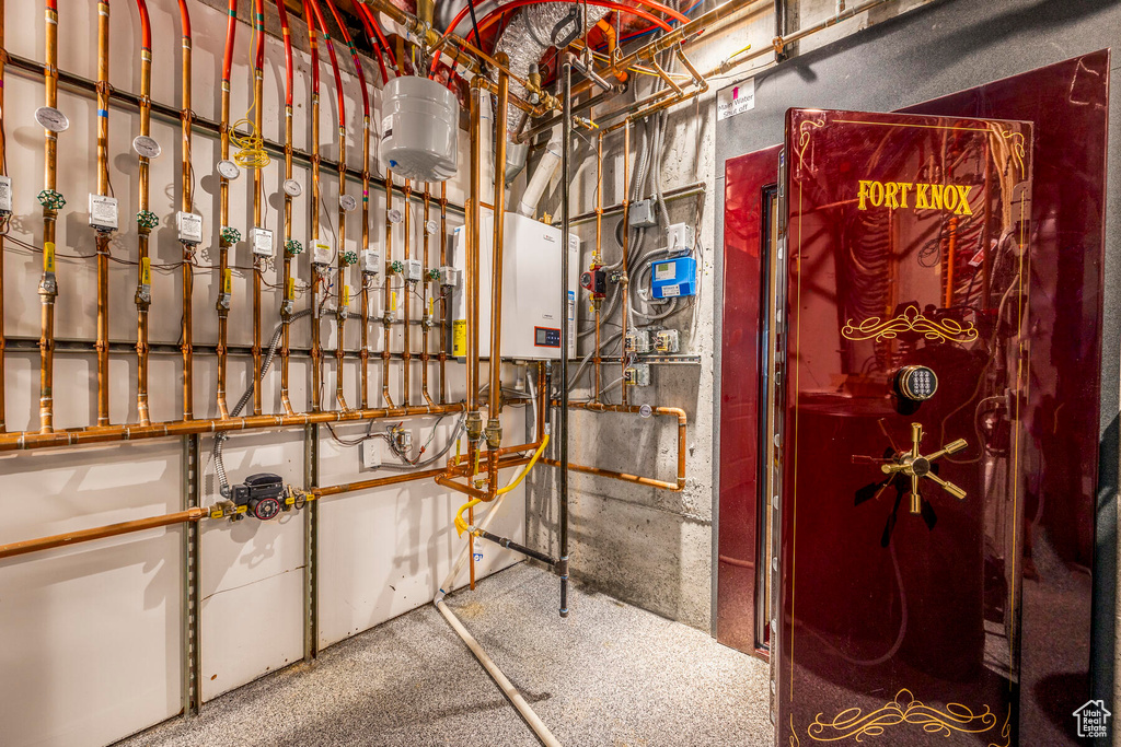 Utility room with tankless water heater