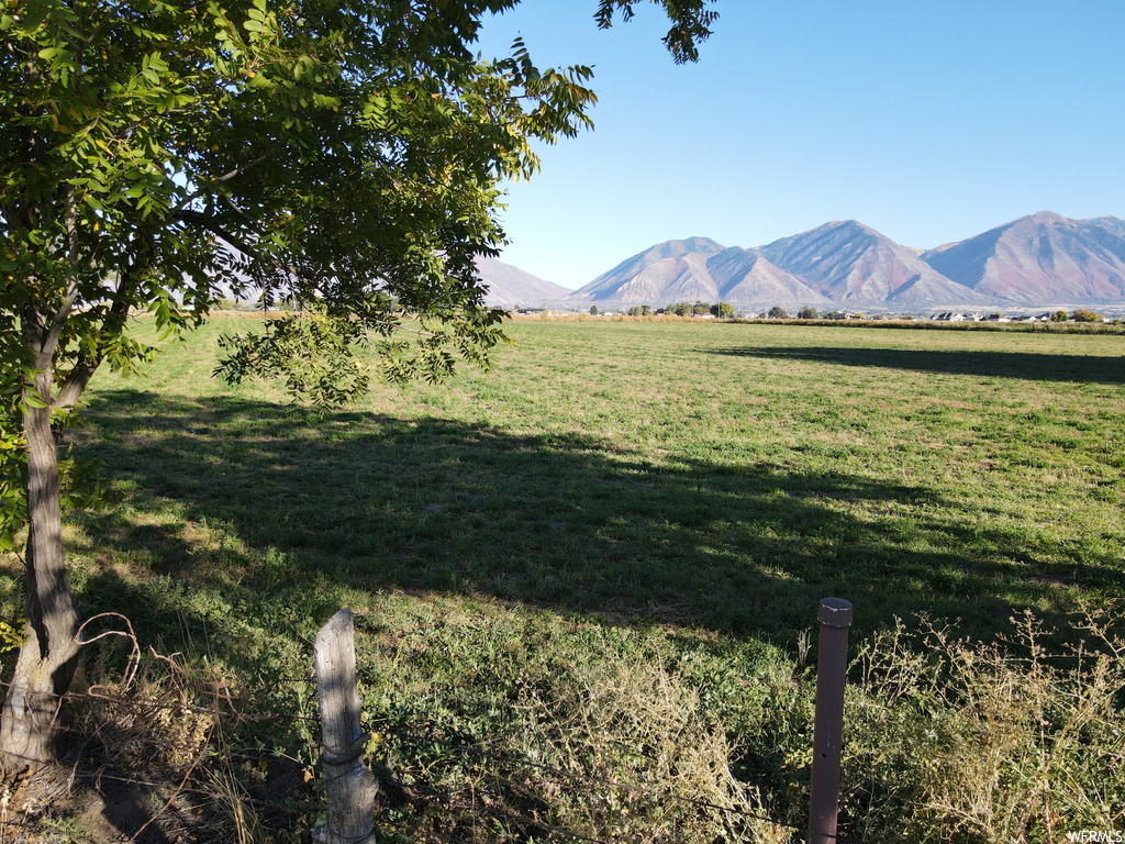 View of mountain feature with a rural view