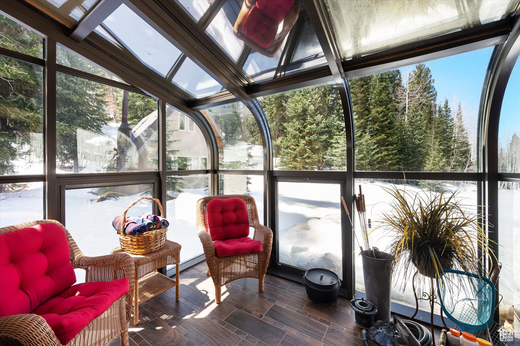 Sunroom / solarium with plenty of natural light and vaulted ceiling