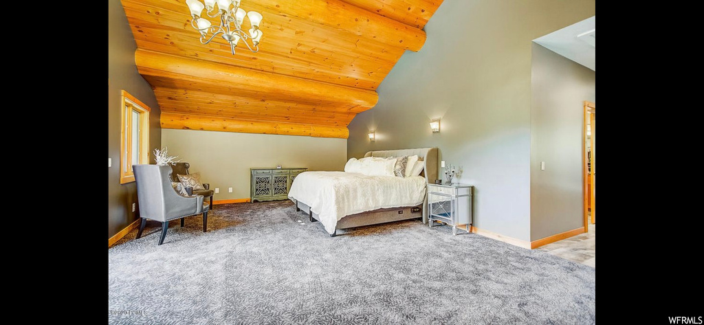 Carpeted bedroom featuring wood ceiling, an inviting chandelier, and lofted ceiling