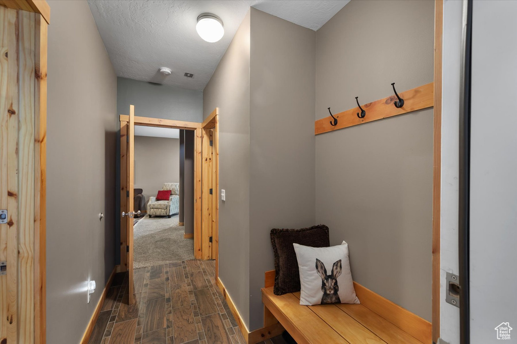Mudroom featuring baseboards