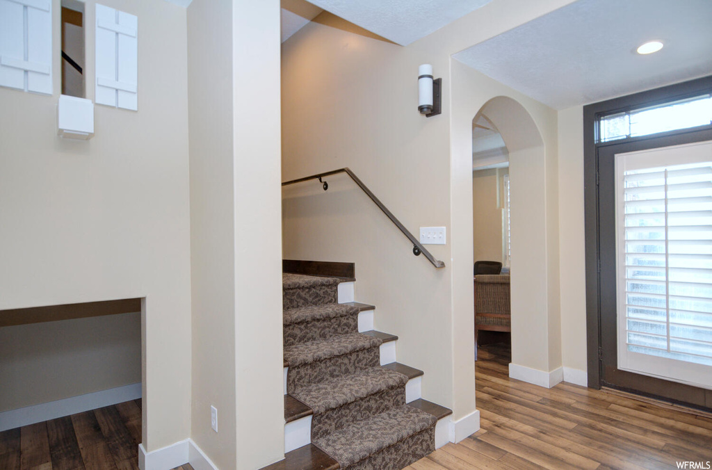 Stairway with hardwood floors