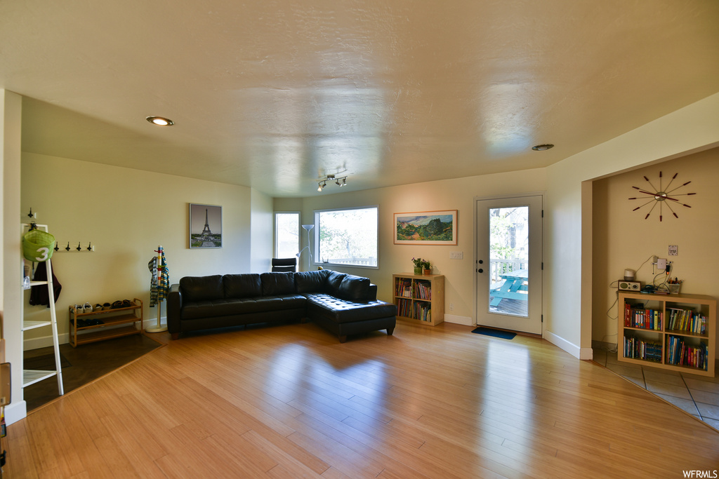 Living room with light tile floors