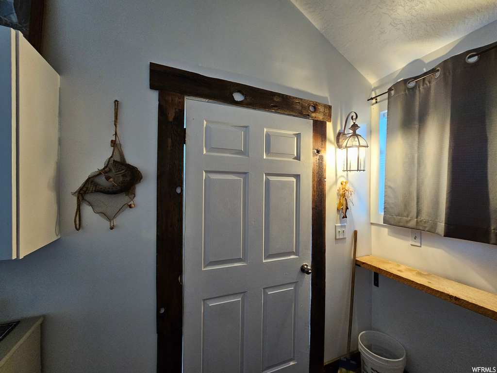 Bathroom with vaulted ceiling