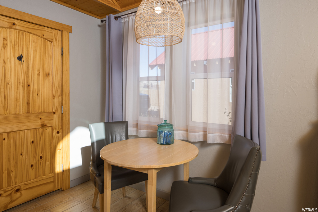 Dining room featuring plenty of natural light and light hardwood / wood-style floors