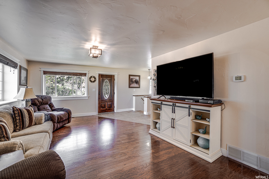 View of hardwood floored living room