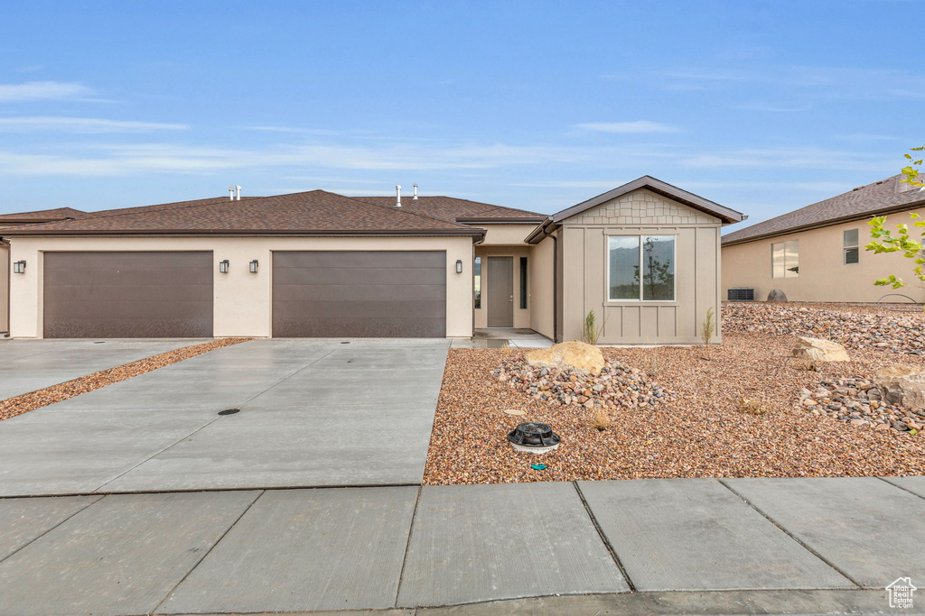 Ranch-style home with a garage