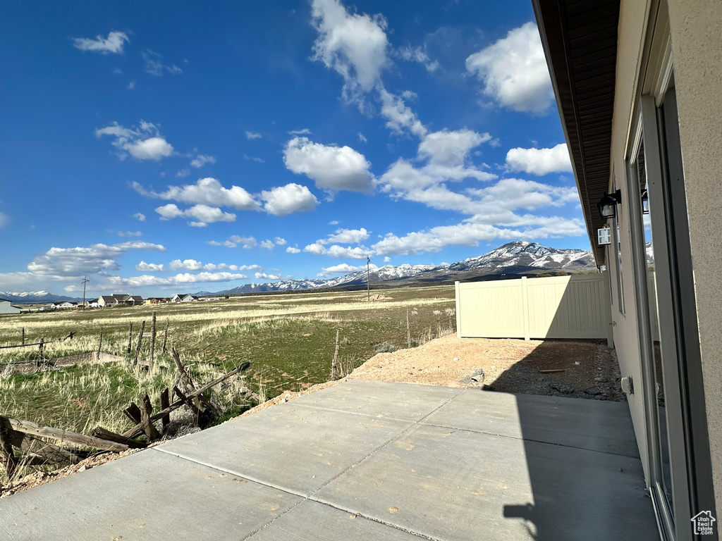 View of patio with a mountain view