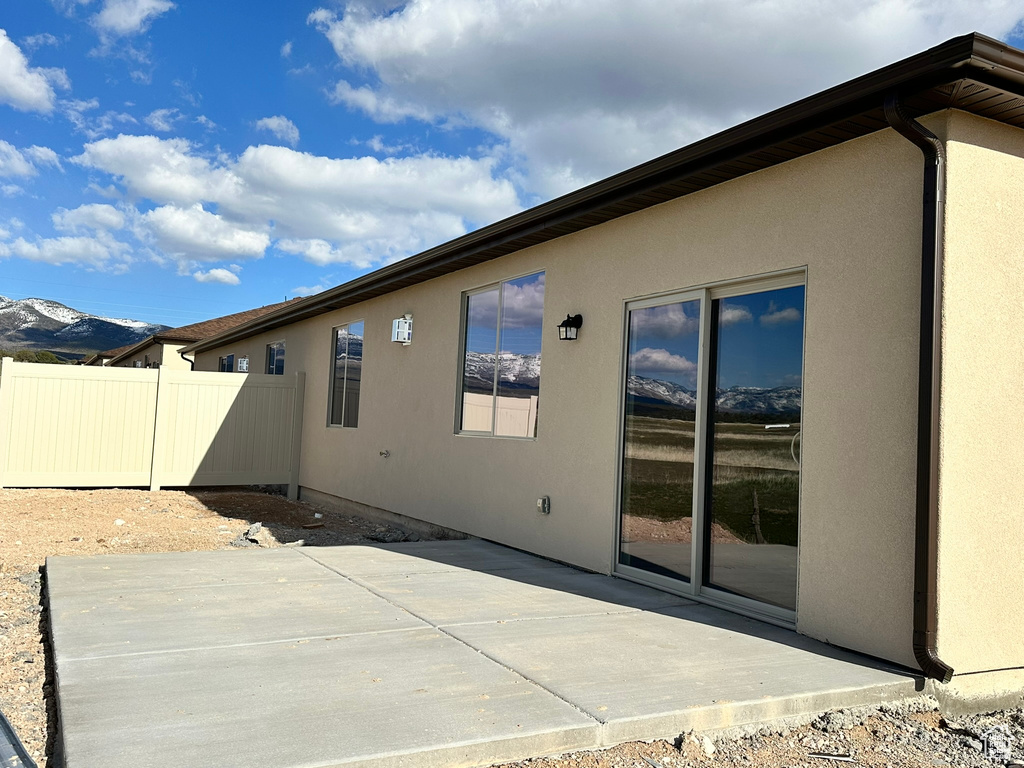 Rear view of house with a patio area