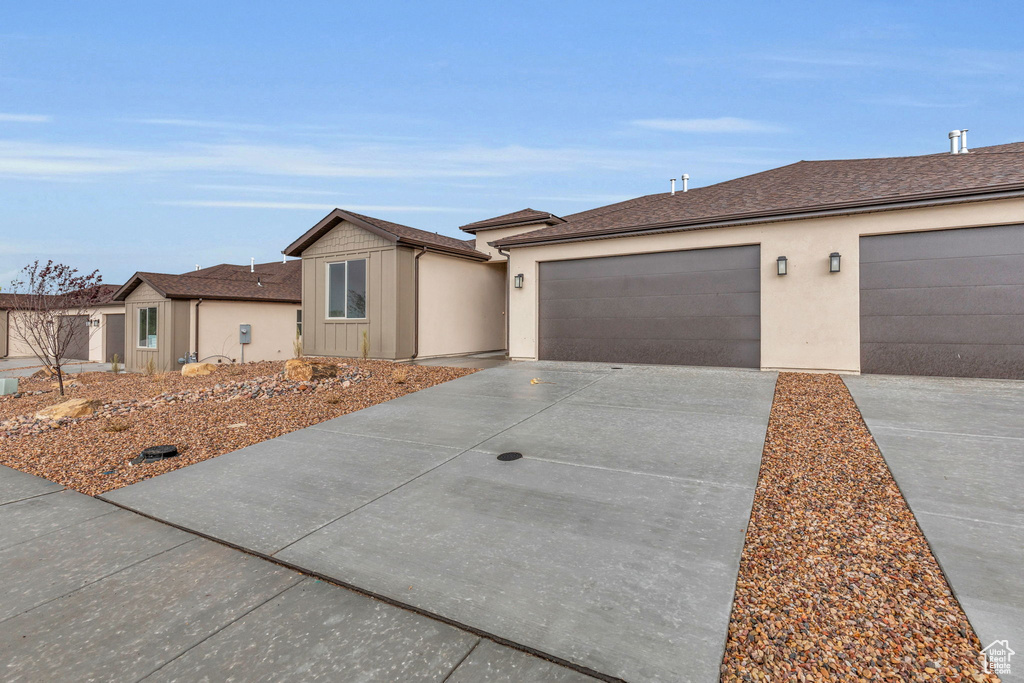 Ranch-style house with a garage