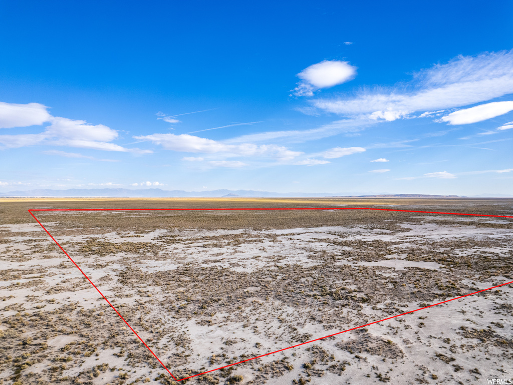 Birds eye view of property featuring a rural view