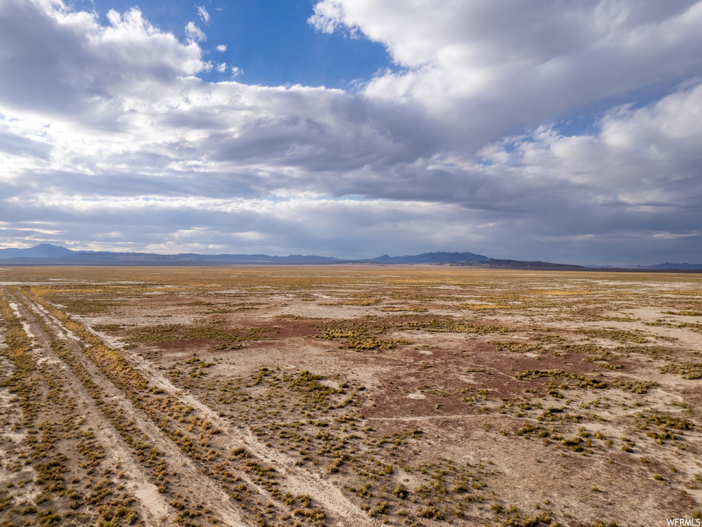 Birds eye view of property featuring a rural view