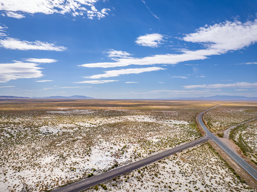 Birds eye view of property with a rural view