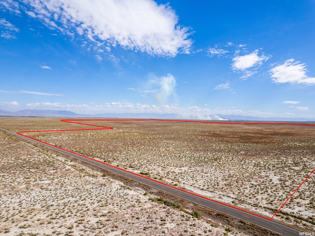 Birds eye view of property featuring a rural view