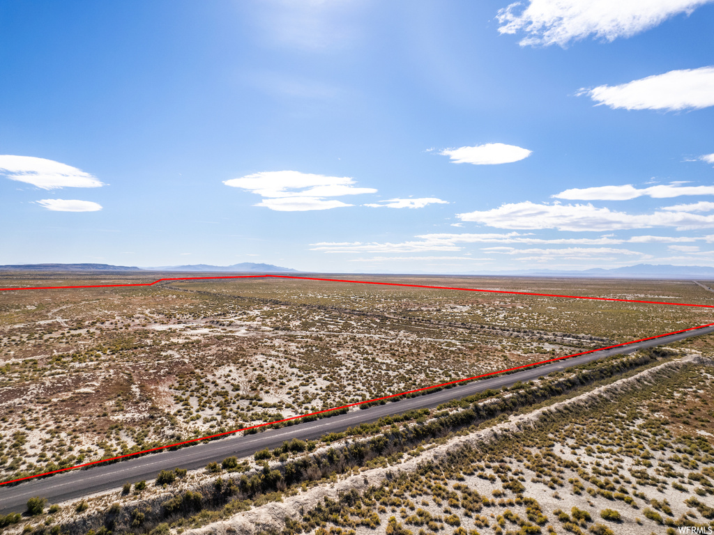 Birds eye view of property with a rural view