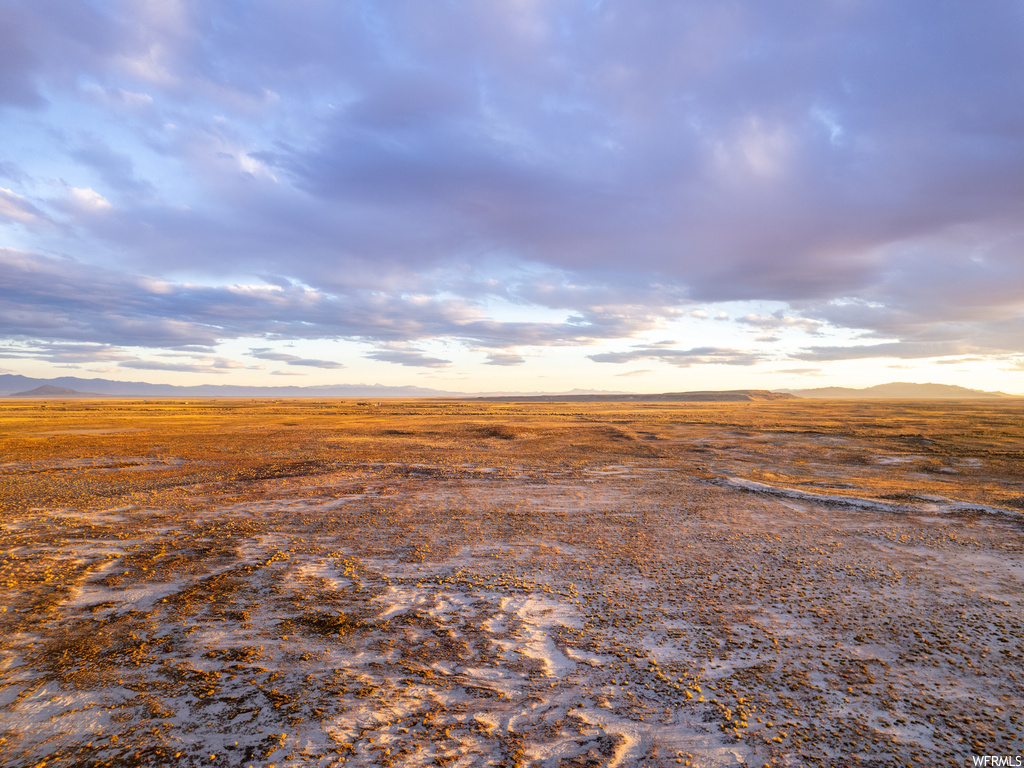 Nature at dusk featuring a rural view