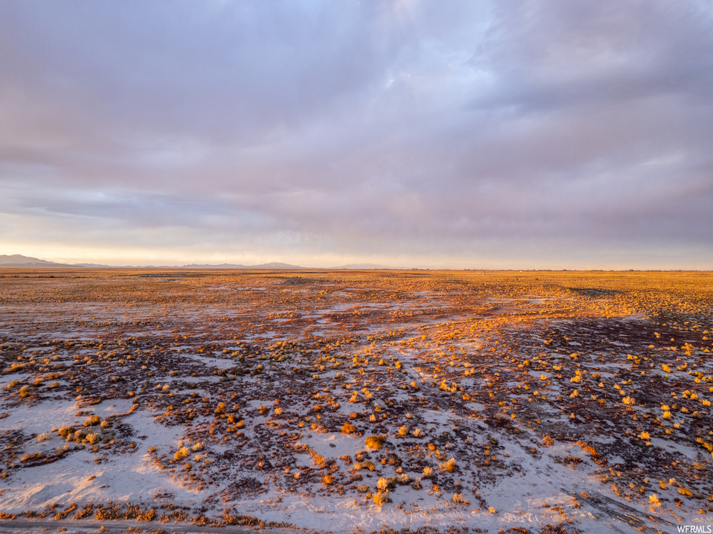 Nature at dusk featuring a rural view