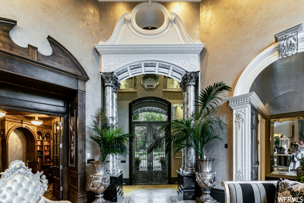 Foyer entrance featuring french doors