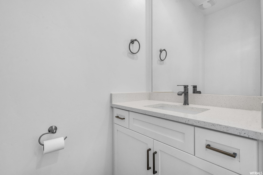Bathroom featuring oversized vanity