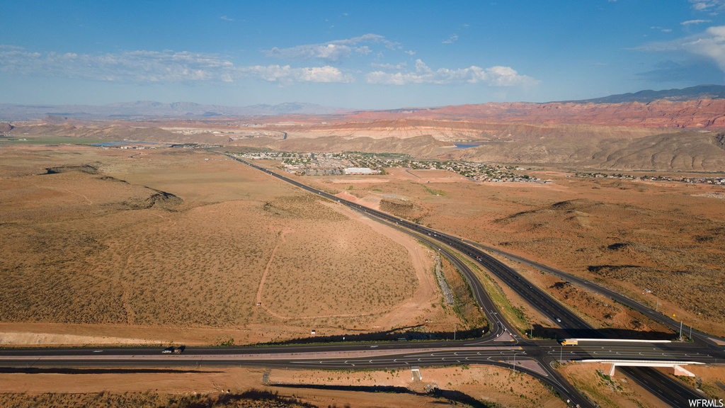 Birds eye view of property featuring a mountain view