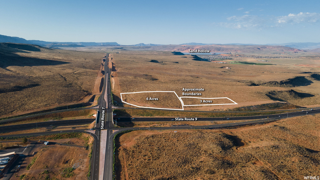 Drone / aerial view featuring a rural view and a mountain view