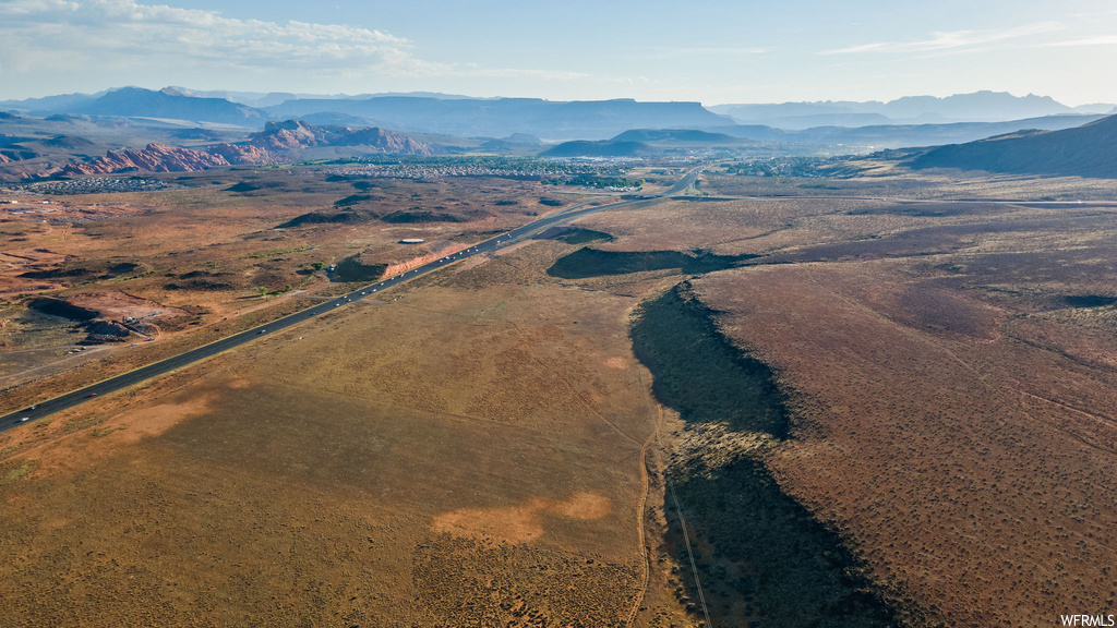 Birds eye view of property featuring a mountain view