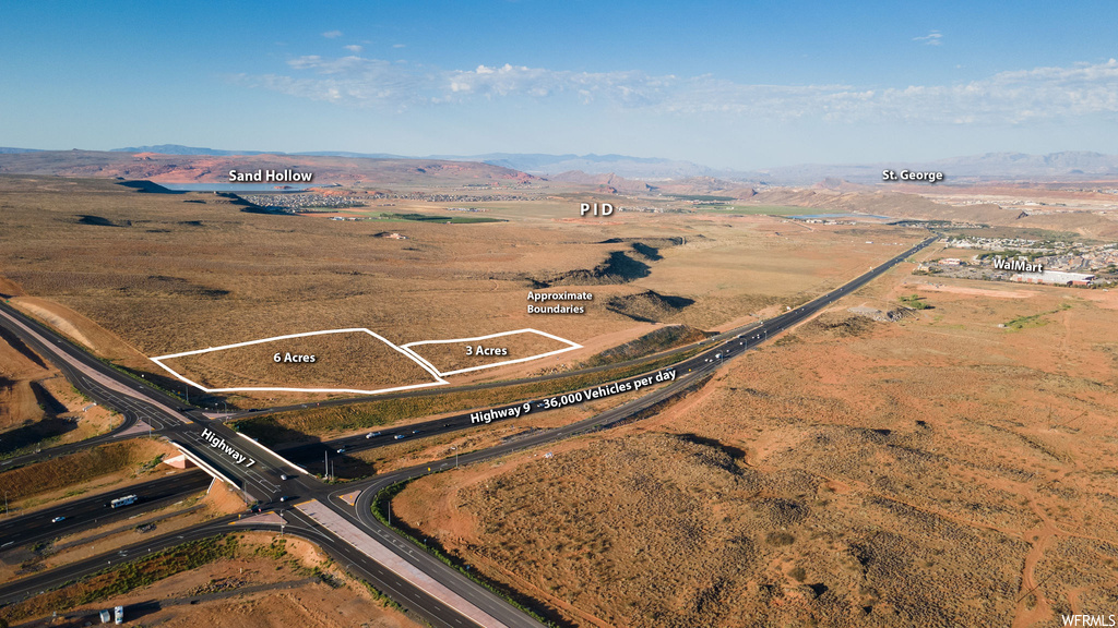 Drone / aerial view featuring a rural view and a mountain view