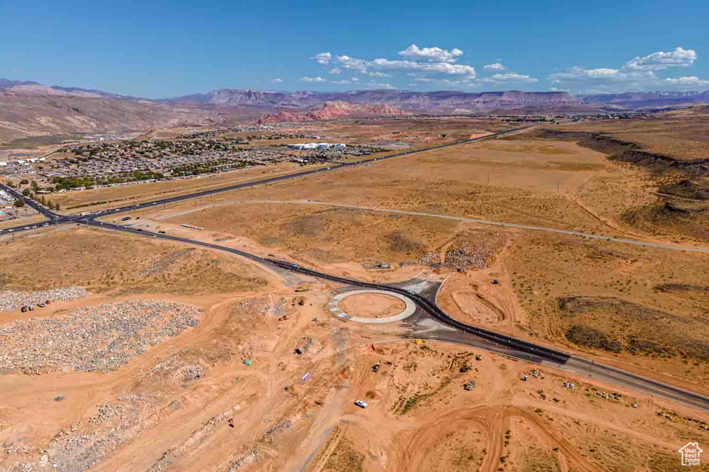 Birds eye view of property with a mountain view