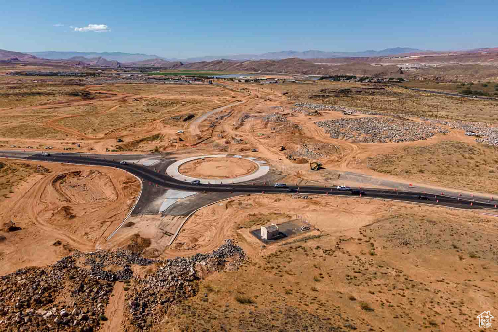 Birds eye view of property with a mountain view