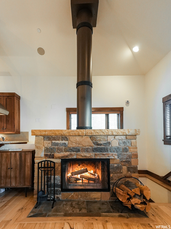 Room details featuring hardwood / wood-style floors and a fireplace