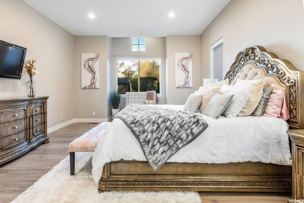 Bedroom featuring light wood-type flooring