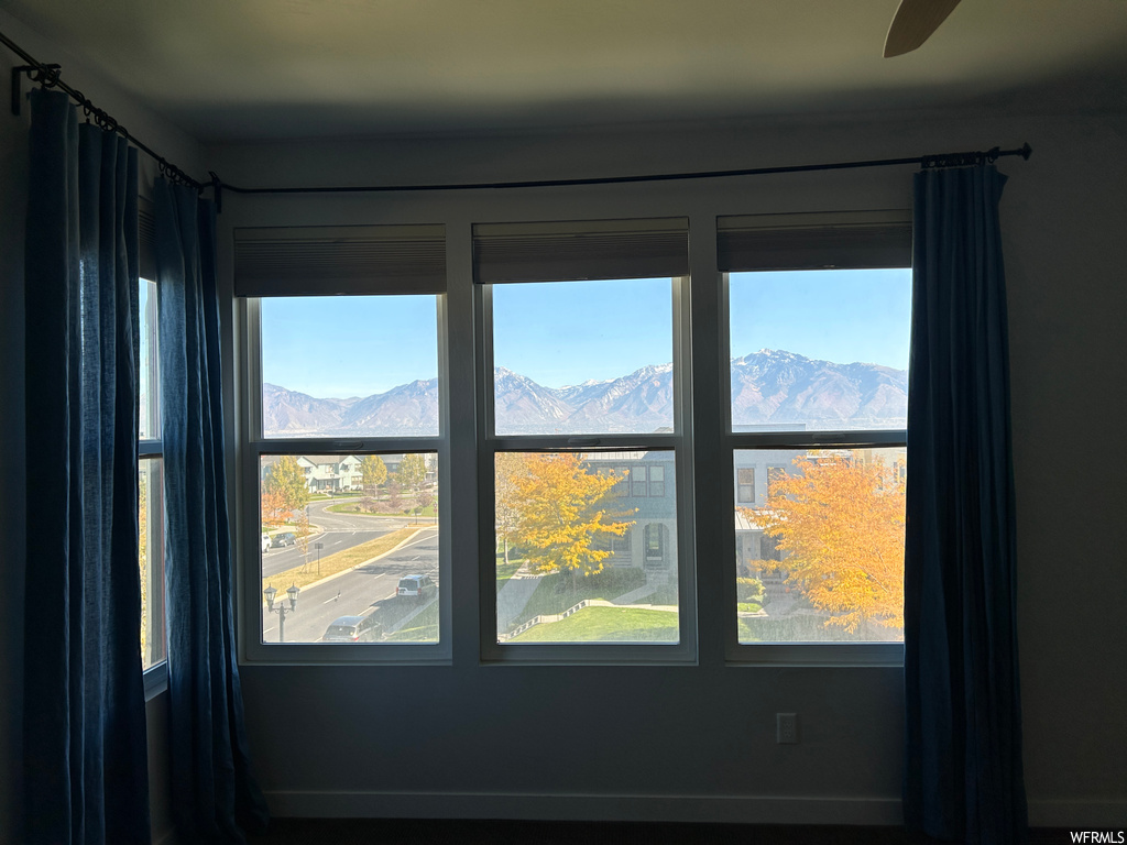 Room details featuring a mountain view