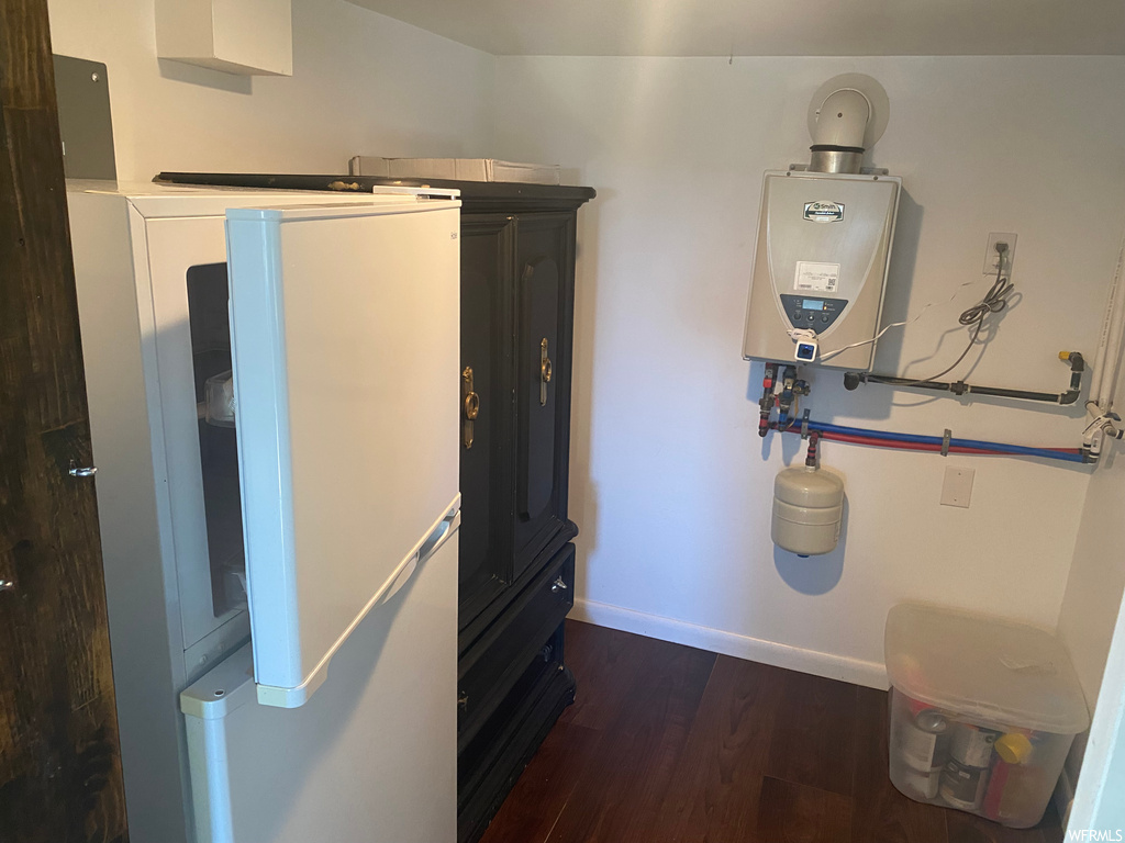 Utility room with tankless water heater