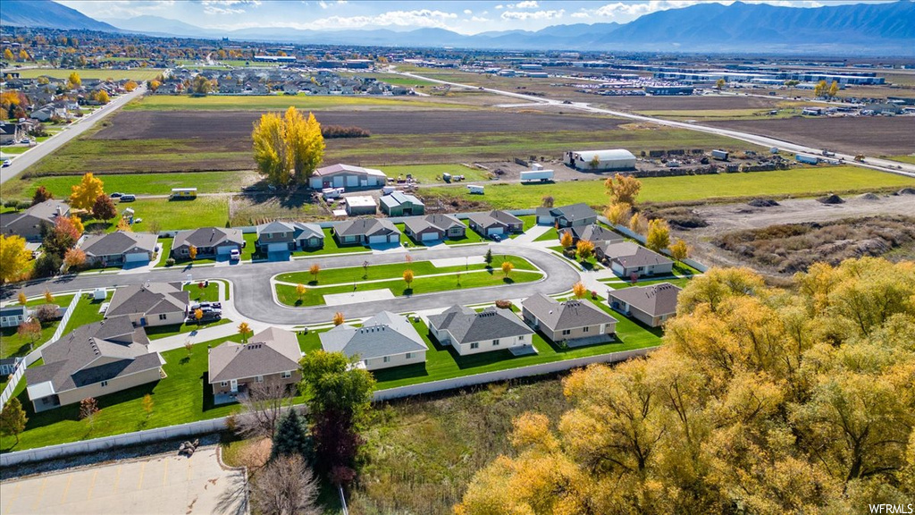 Drone / aerial view featuring a mountain view